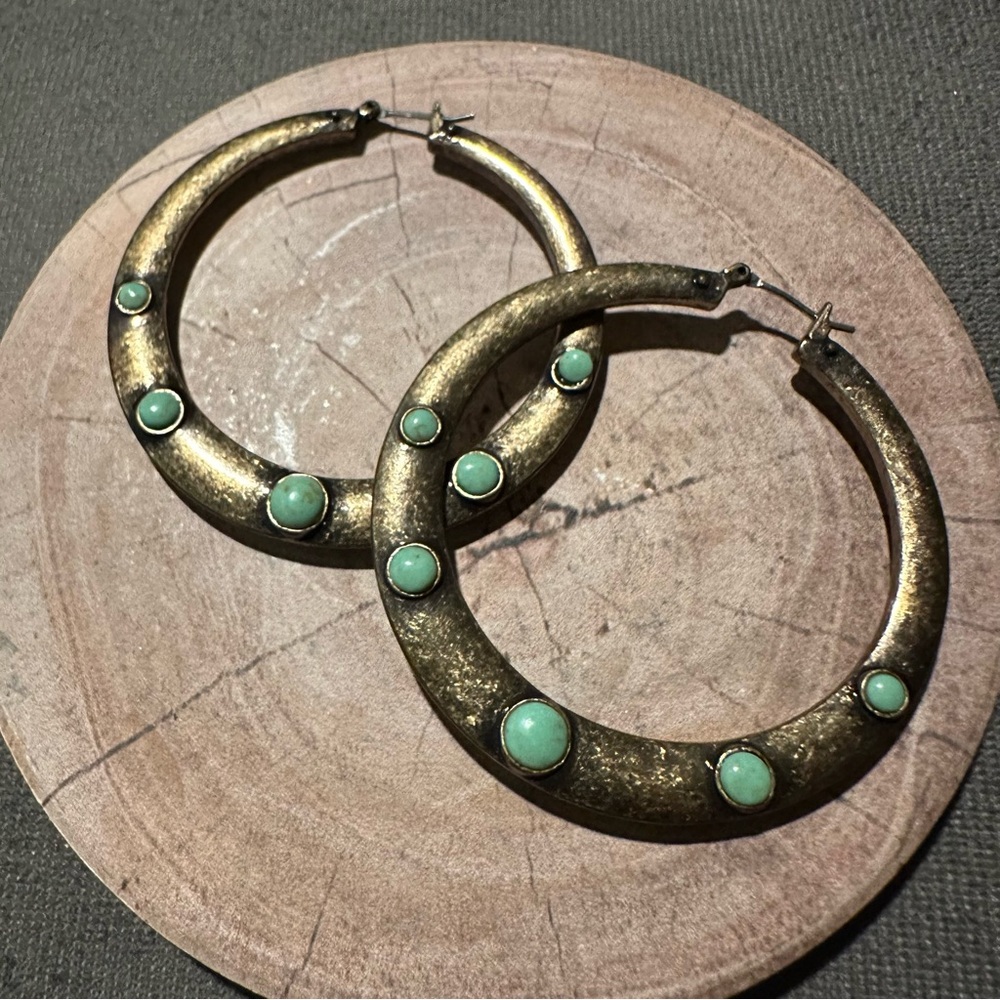Antique brass colored hoop earrings with faux turquoise